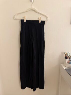 H&M Black Hight Waisted Wide Leg Trousers with Slits at the Bottom in Size 4